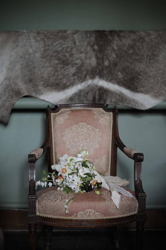 Spring bouquet on antique armchair 