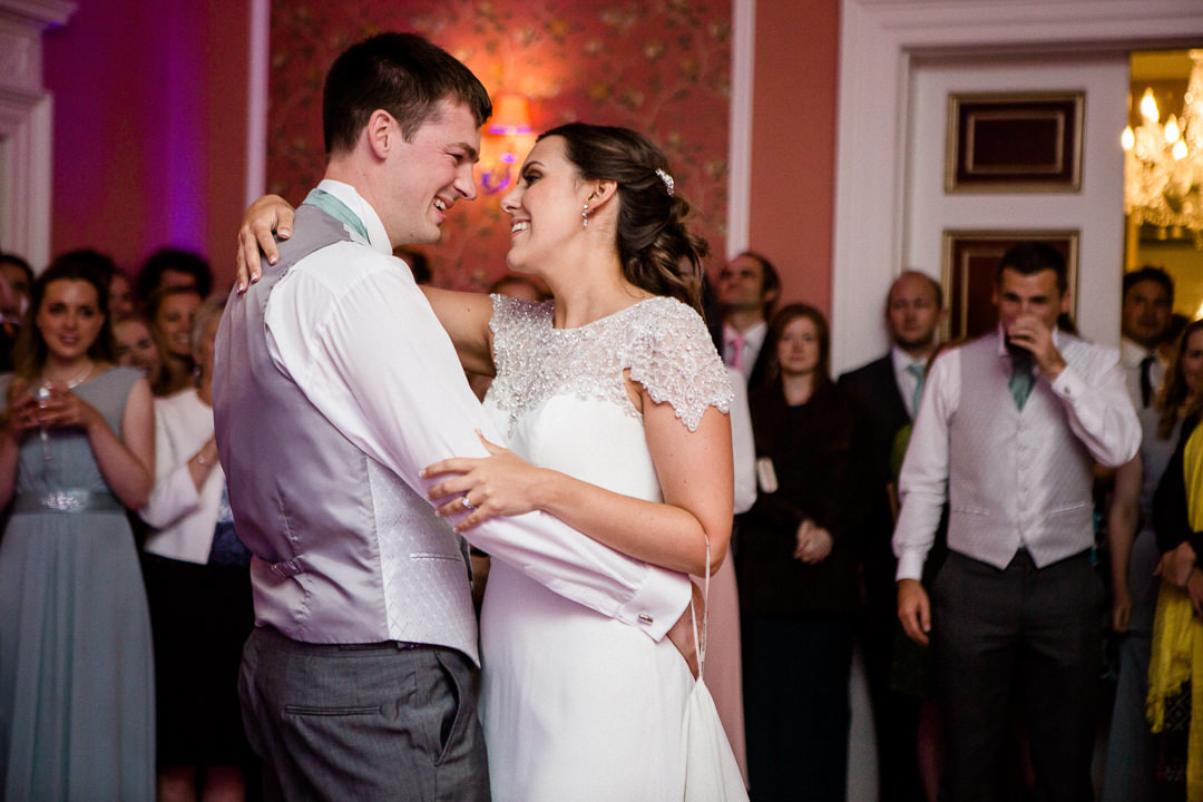 Bride and groom have their first dance in the luxury ballroom at Penton Park