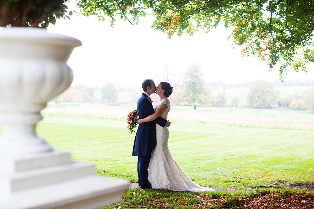 Taking a moment out together away from the crowds, at Penton Park a luxury wedding venue in Hampshire