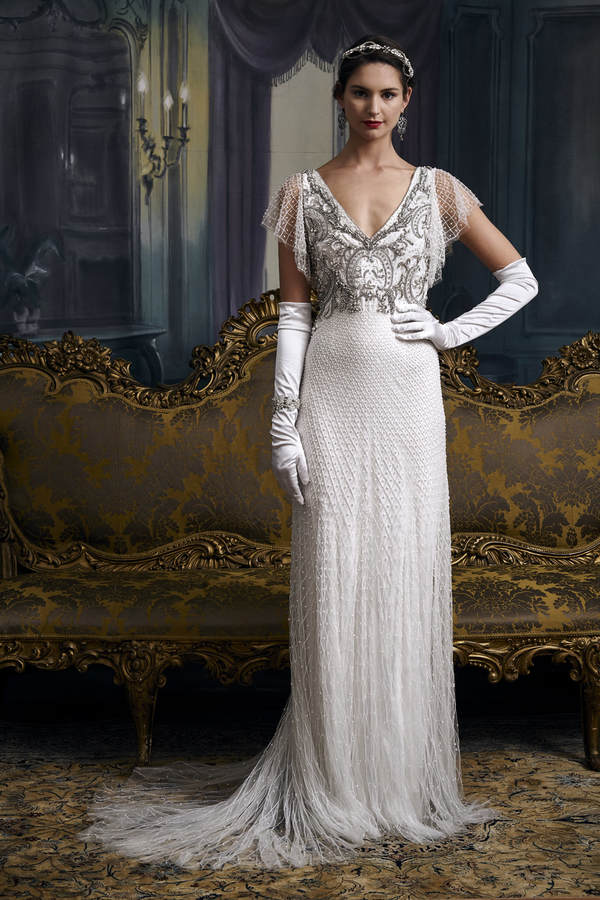 Model wears 1920s style beaded wedding dress by Eliza Jane Howell